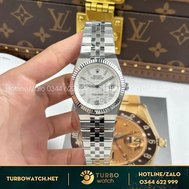 Đồng Hồ Rolex Land-Dweller 127236 Replica 11 Mặt Trắng Họa Tiết Tổ Ong 36mm